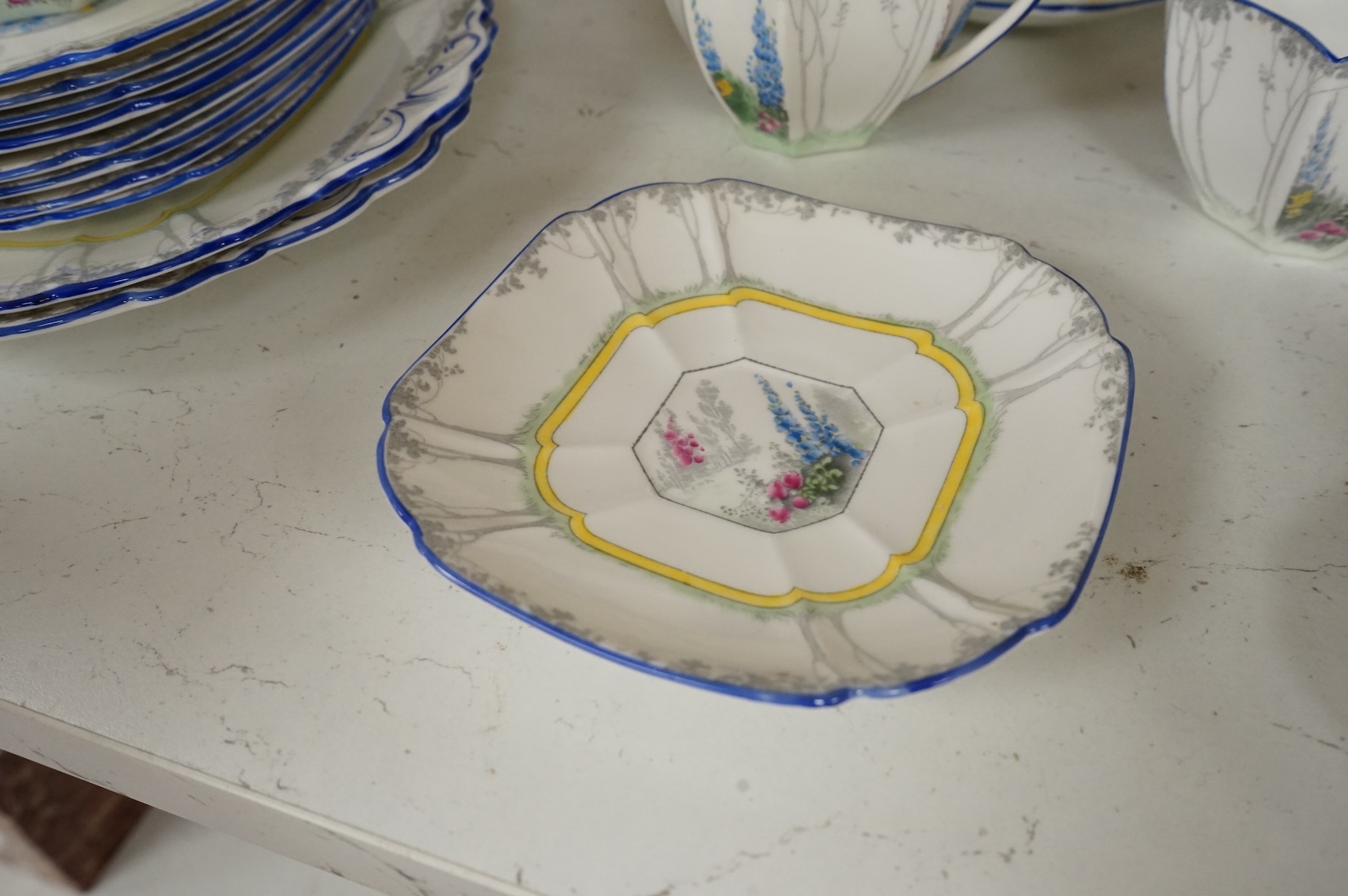 An Art Deco Shelley ‘My Garden’ part teaset to include cups, saucers, jugs and sandwich plates